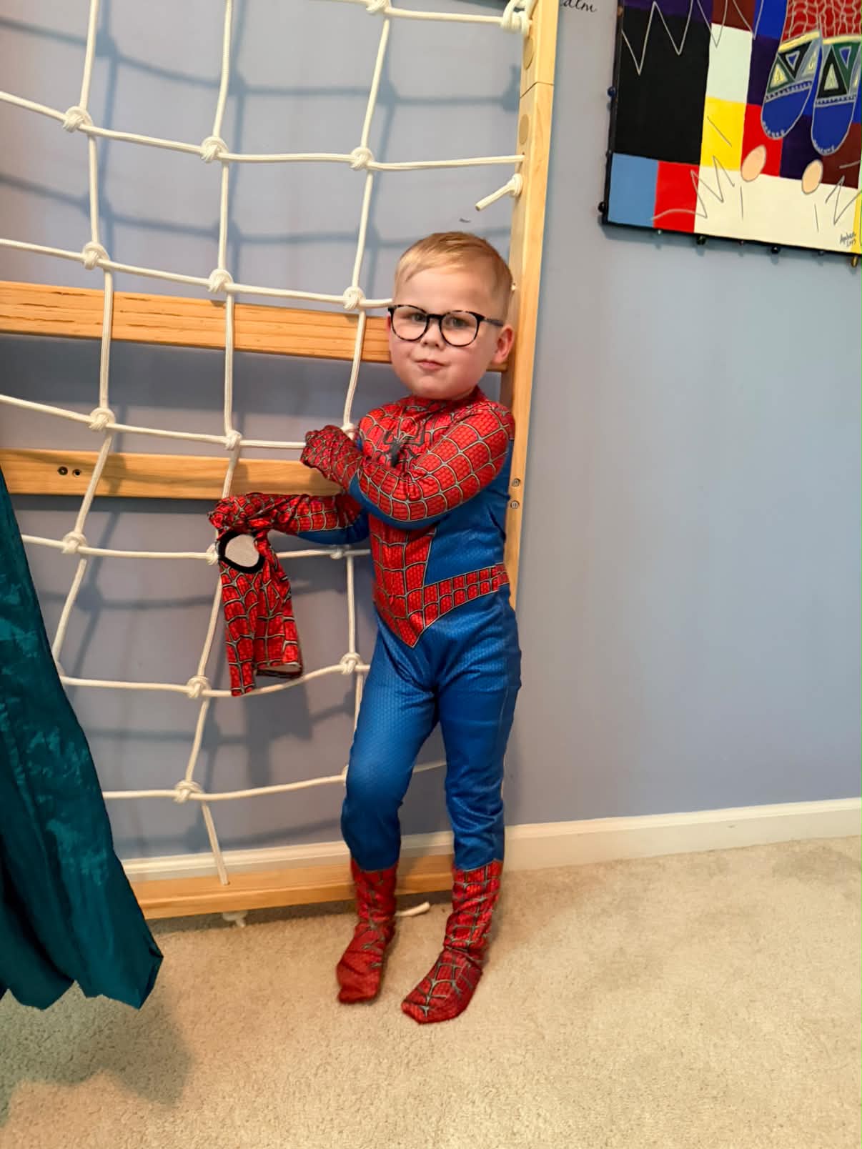 Felix in a Spider-Man suit